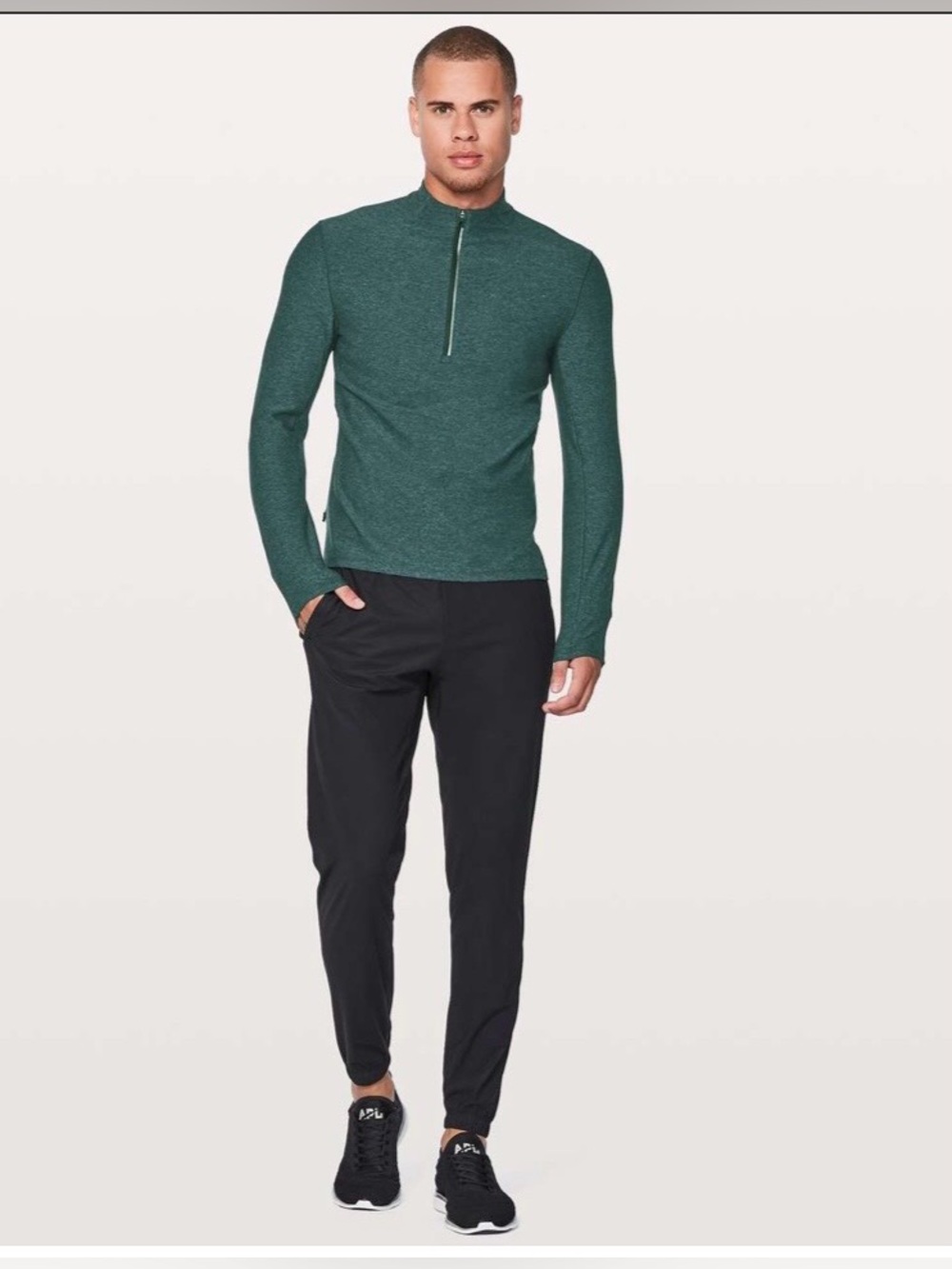 Lululemon Surge Warm 1/2 Zip
Heathered Nocturnal Teal / Black large